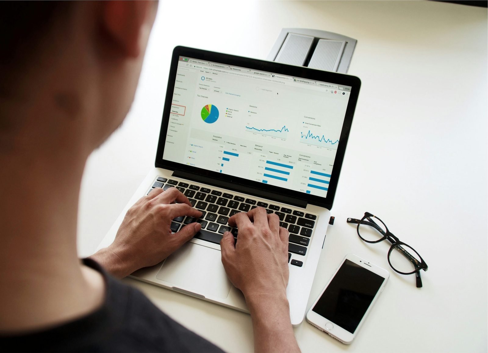 Consultant and client reviewing customer data and reporting