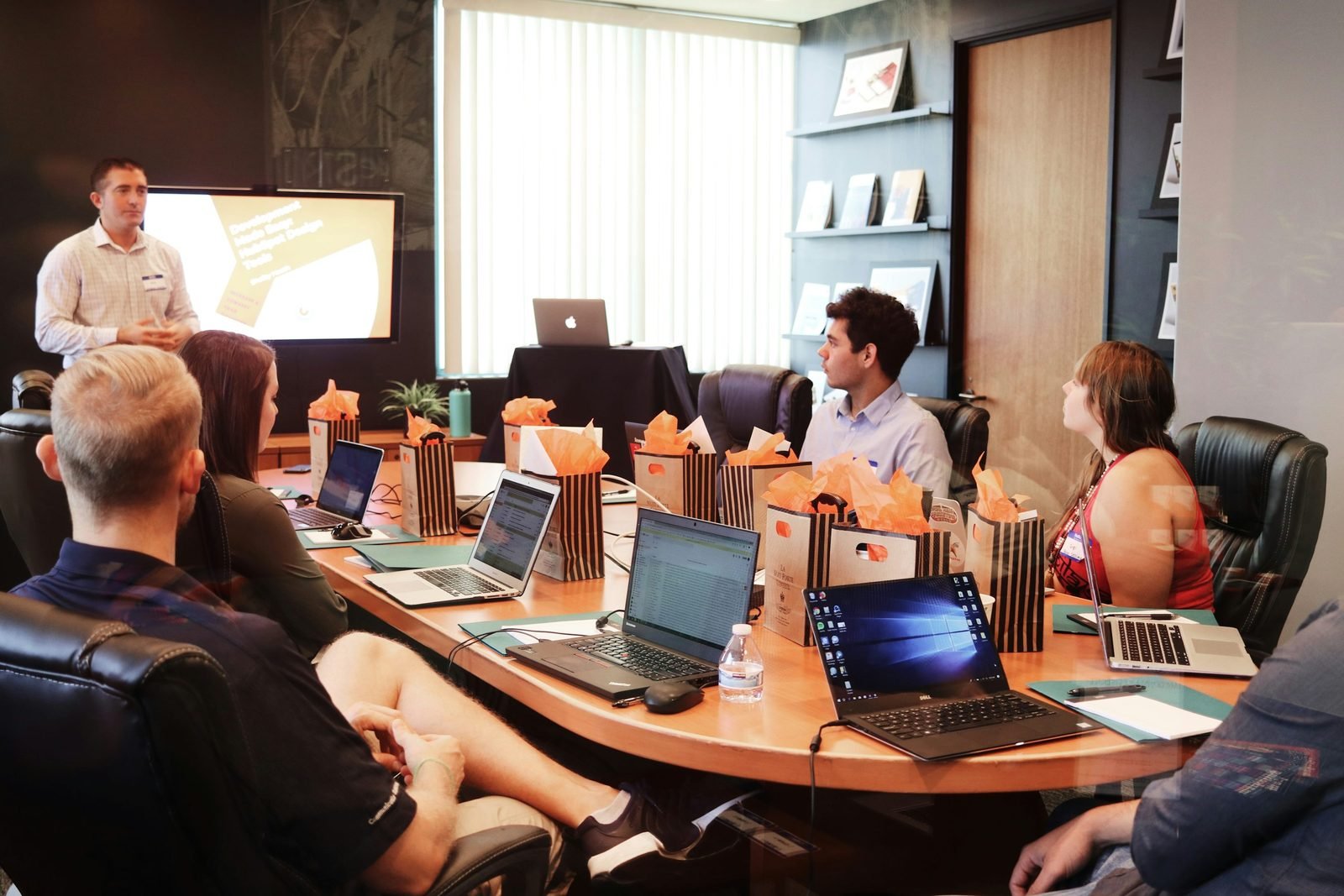 A UK sales team working together on customer follow-up